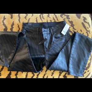 Faux leather black on black zebra print jeans.